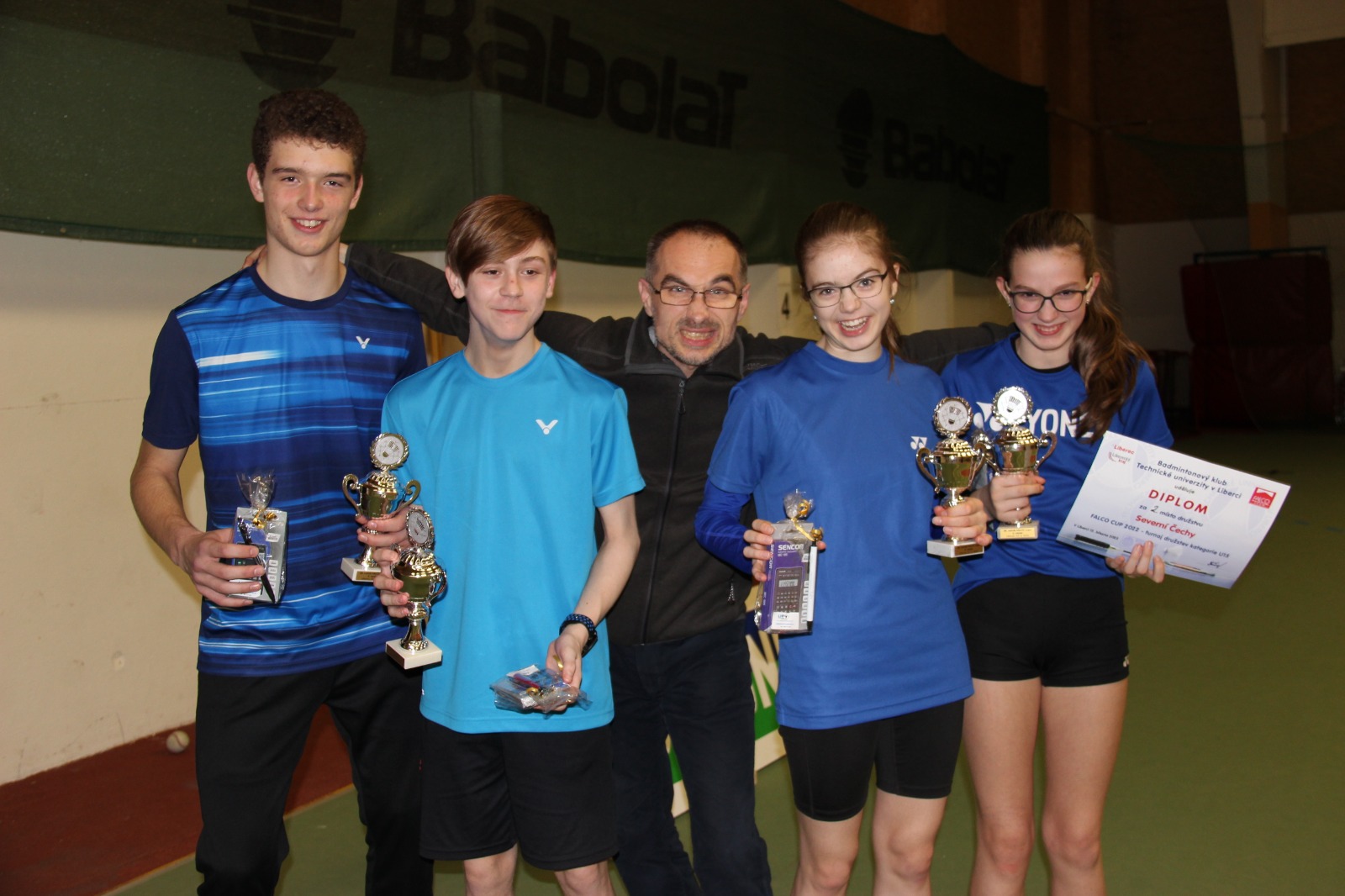 Photo with team and trophies